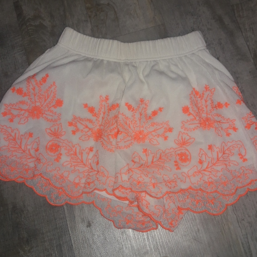 White and orange shorts